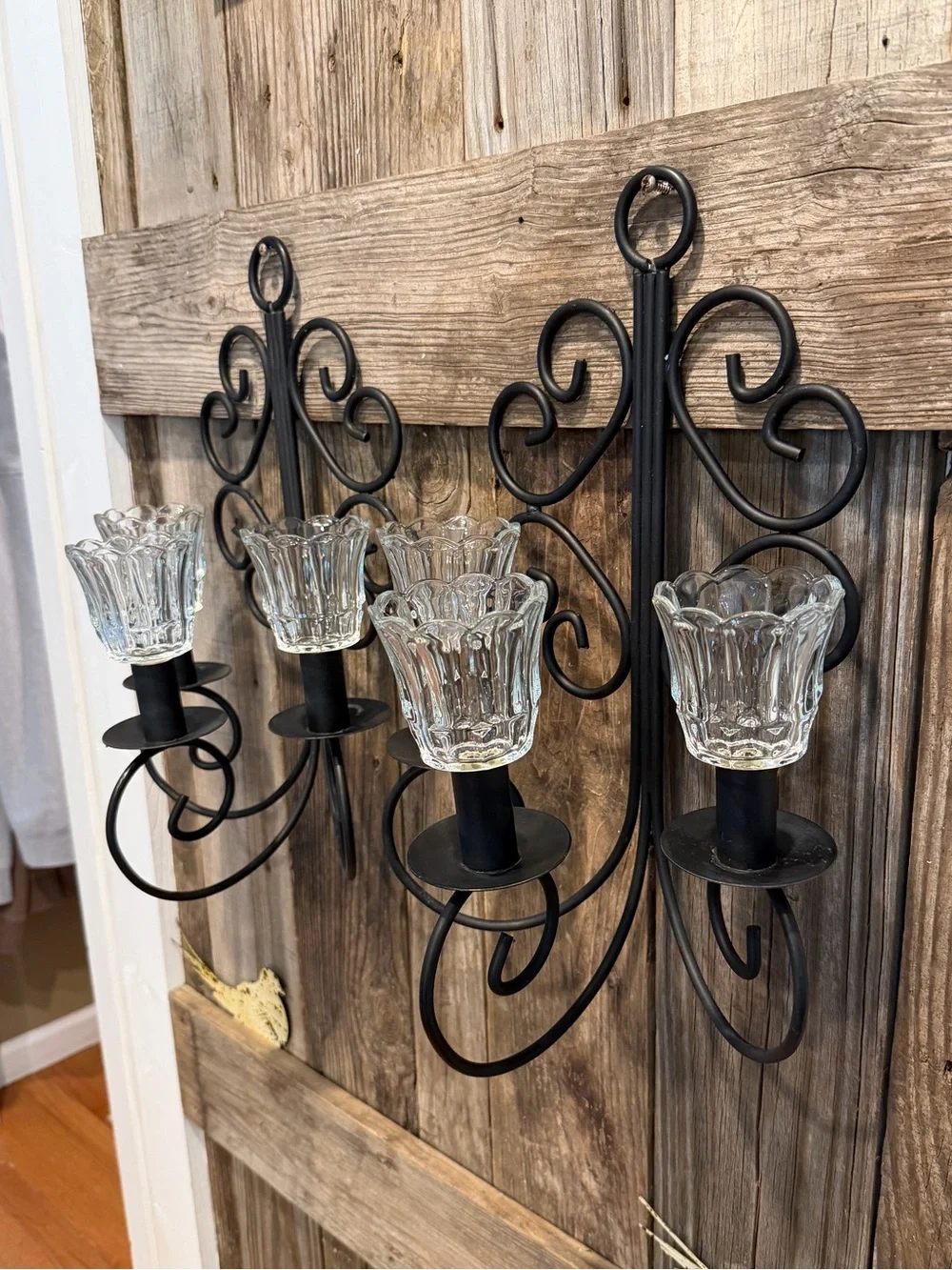 Pair of Vintage Black Scroll Metal Wall Sconces with Clear Glass Shades